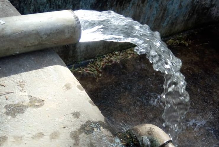 Water flowing from the pump of the green flower foundation farm. Ethiopia (Bishoftu).